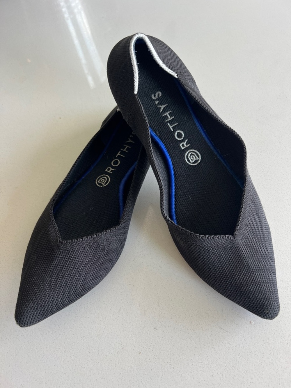 Rothy's Black Pointed Knit Flats with Blue Insole Trim